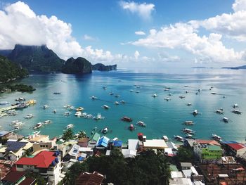 High angle view of sea against blue sky