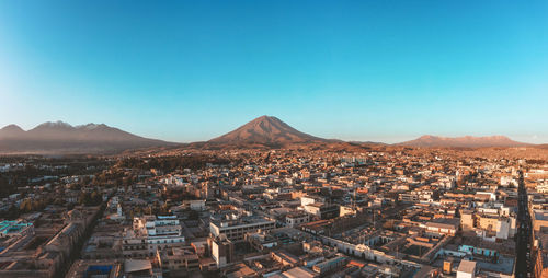 Arequipa, peru with its iconic misti, chachani and picchu picchu volcano in the background.