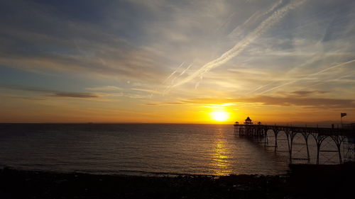 Scenic view of sea at sunset