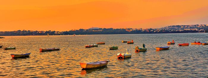 Scenic view of sea against clear sky during sunset