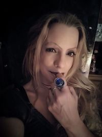 Portrait of a beautiful young woman in bubbles