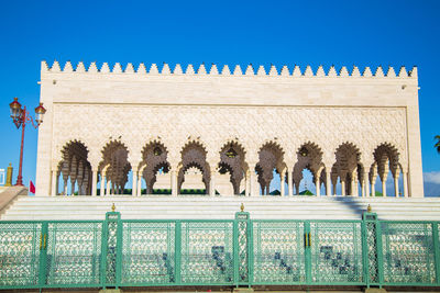 Panoramic shot of building against blue sky