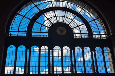 Low angle view of glass window in building