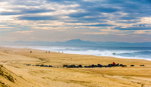 Scenic view of beach against sky