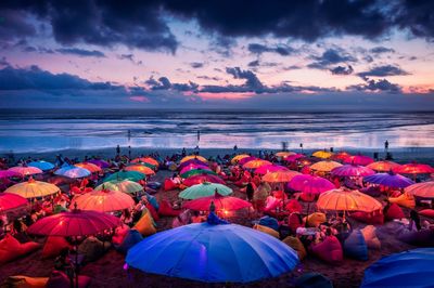 Scenic view of beach against sky during sunset