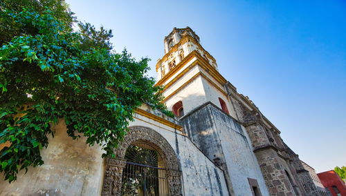 Low angle view of historic building against sky