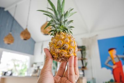 Midsection of person holding food