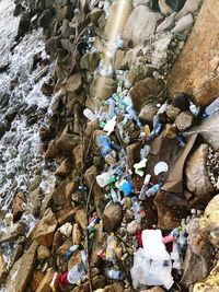 High angle view of rock formation in sea