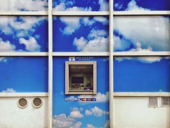 Low angle view of building against blue sky