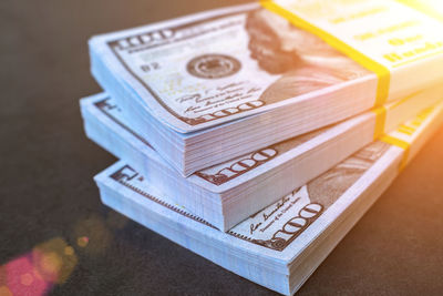 Close-up of paper currencies on table