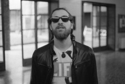 Portrait of young man wearing sunglasses