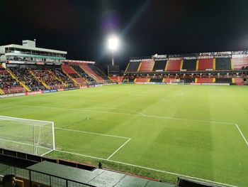 View of soccer field against sky at night