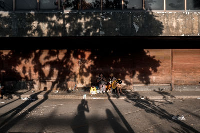 People walking on city street