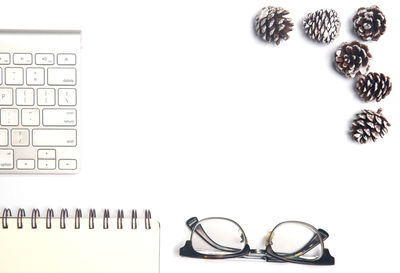 Close-up of eyeglasses against white background