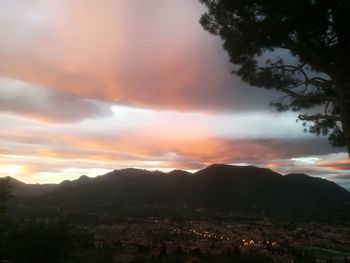 Scenic view of mountains against sky during sunset