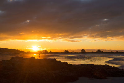 Scenic view of sunset over sea