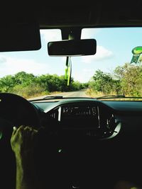 Close-up of man driving car