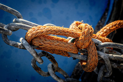 Close-up of rope tied on metal