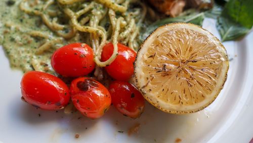 High angle view of fruits in plate on table