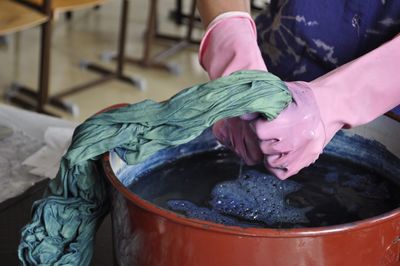 Close-up of woman working in container