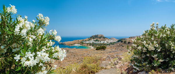 Panoramic view at lindos with ruins of ancient acropolis.. island of rhodes. greece.