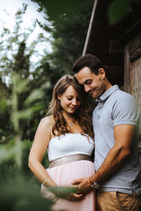 Young couple standing outdoors