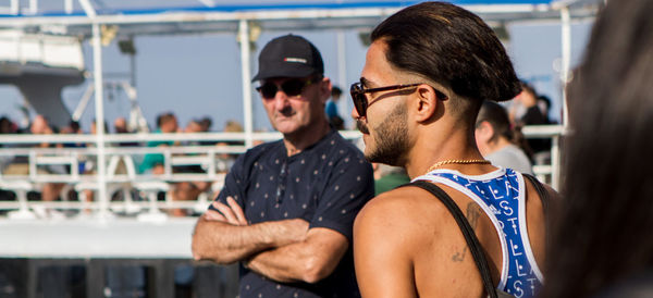 Man and sunglasses on boat