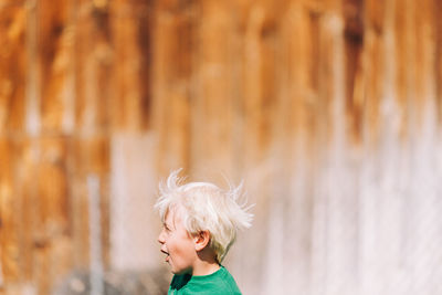 Head of young boy playing