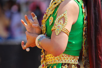 Close-up of woman  dancing to the gods.