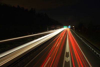 Light trails on road at night