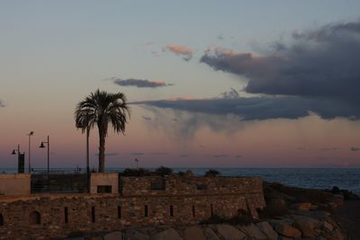 Scenic view of sea against cloudy sky