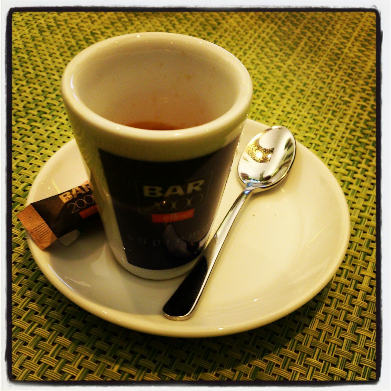 food and drink, drink, coffee cup, indoors, refreshment, table, coffee - drink, saucer, transfer print, freshness, still life, coffee, spoon, cup, plate, high angle view, breakfast, auto post production filter, tea cup, food