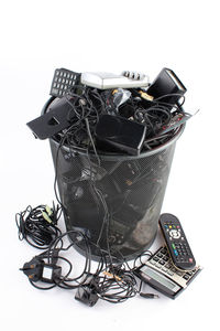 Close-up of broken camera on white background