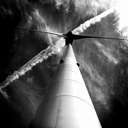 Low angle view of wind turbine against sky