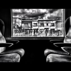 Man seen through train window