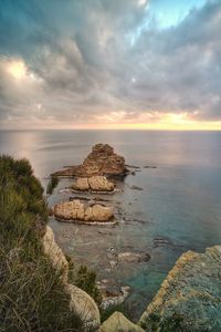 Scenic view of sea against sky during sunset