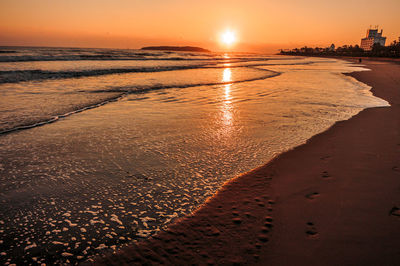 Scenic view of beach during sunset