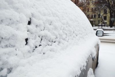 Close-up of snow on car windshield