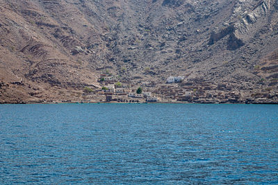 View of sea against mountain