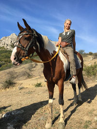 Man riding horse