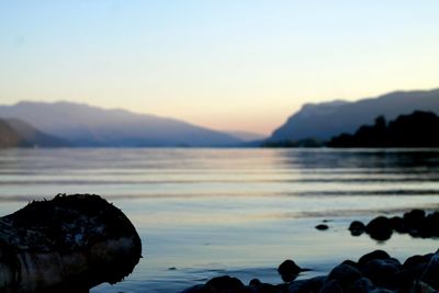 Scenic view of lake against sky during sunset
