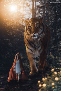 Woman standing in a forest