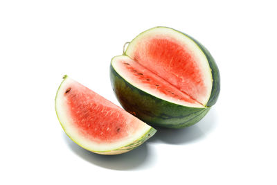 Close-up of fruits against white background