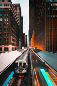 High angle view of illuminated buildings in city