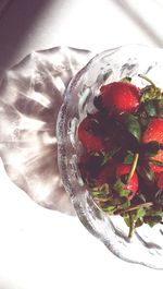 High angle view of strawberries on table