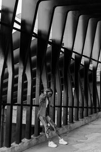 Rear view of man walking on street