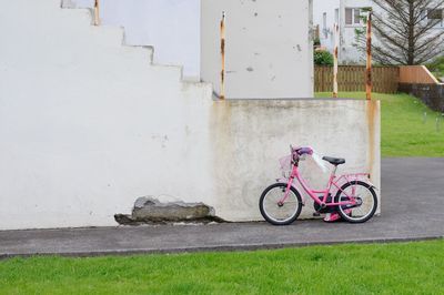 Bicycle against wall in building