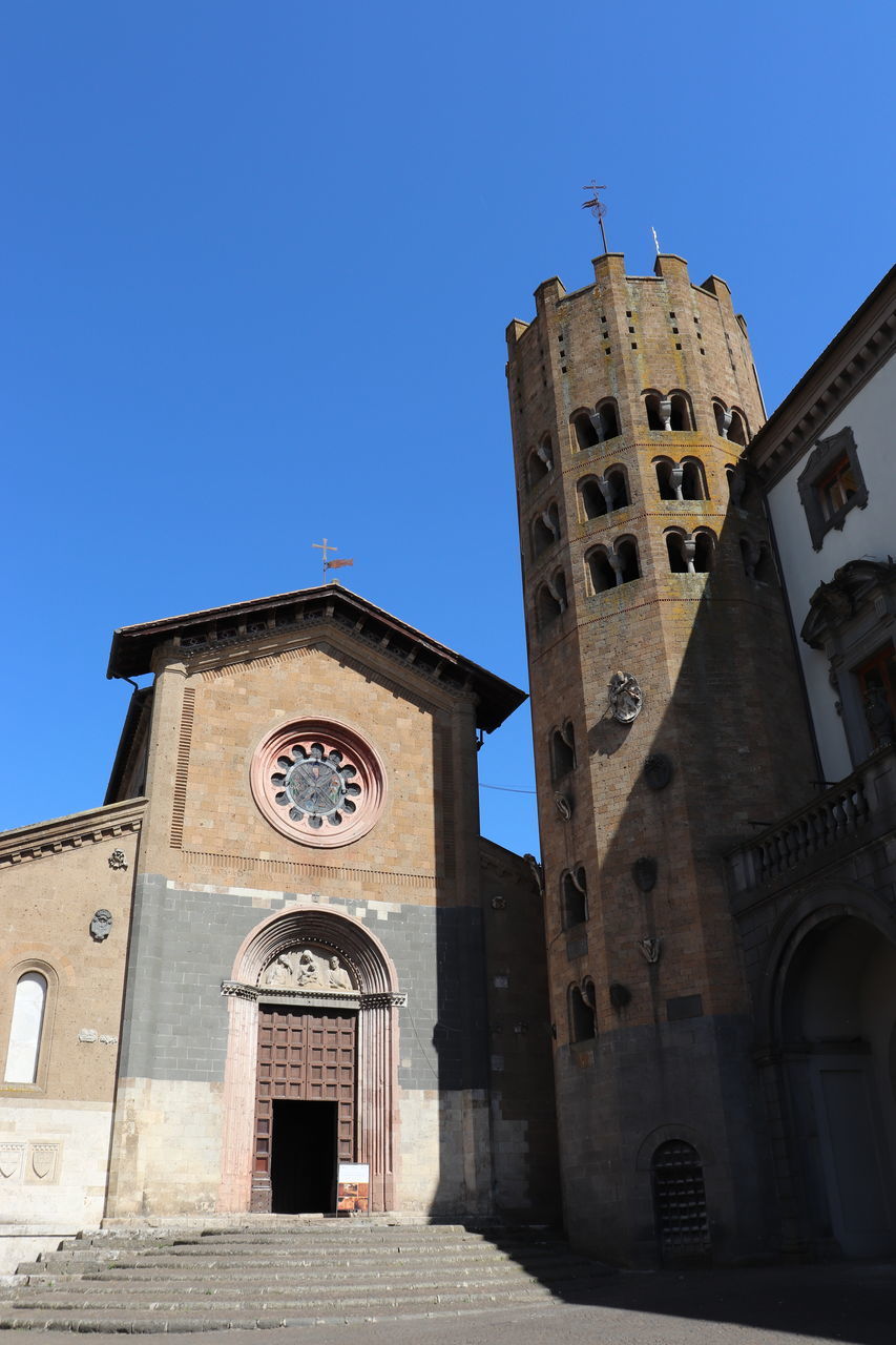 LOW ANGLE VIEW OF CHURCH AGAINST BUILDING