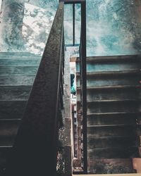 Low angle view of woman walking on stairs