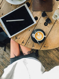High angle view of coffee cup on table